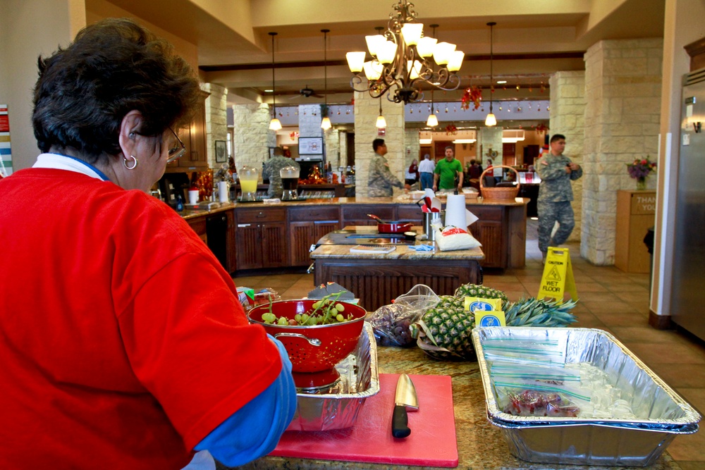 Volunteer Prepares Meals at Warrior and Family Support Center
