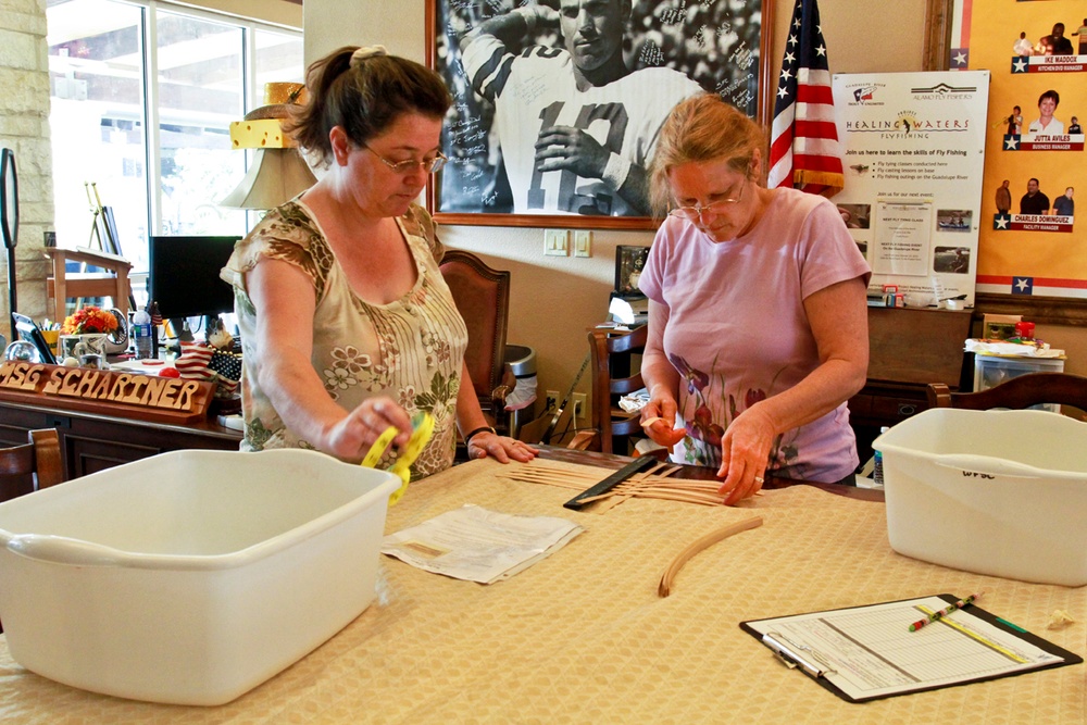 Volunteer Teaches Wounded Soldier's Mother Basket-Making at Support Center