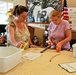 Volunteer Teaches Wounded Soldier's Mother Basket-Making at Support Center
