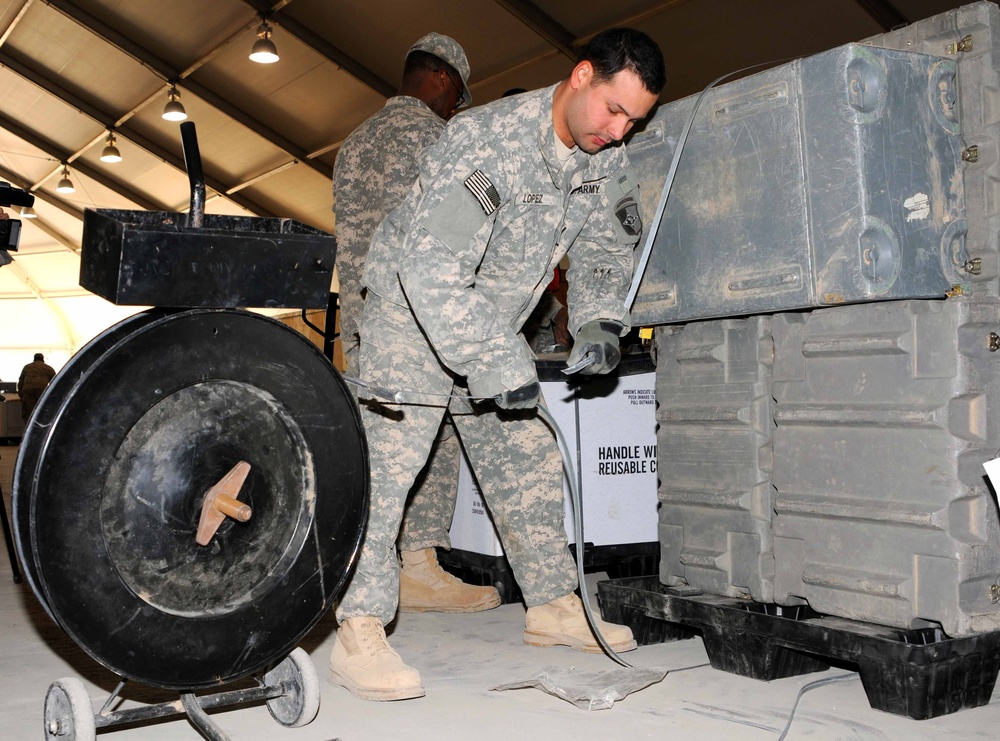 U.S. Soldier Secures Equipment at Iraqi Base
