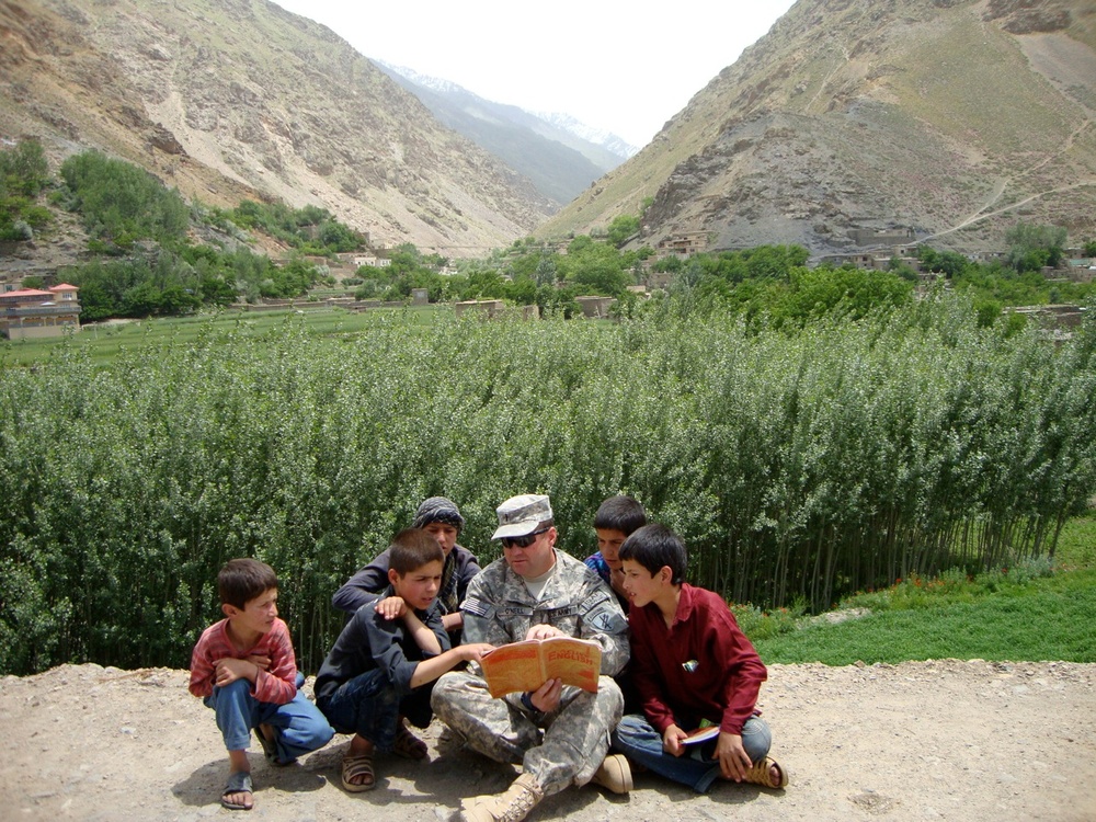 Army Officer Brings Books to Afghan Children Through Family Initiative