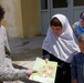Army Officer Distributes Children's Books to Afghan Kids