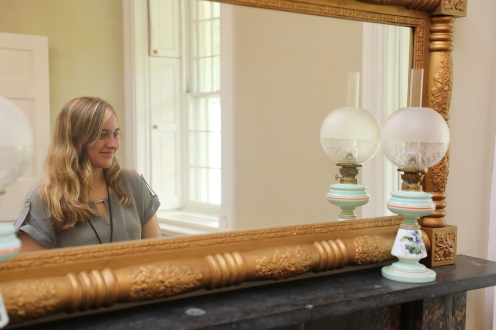 Admiring a French Hand-Blown Lamp