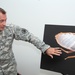 Army Officer Educates on Bed Bugs at Earth Day Event