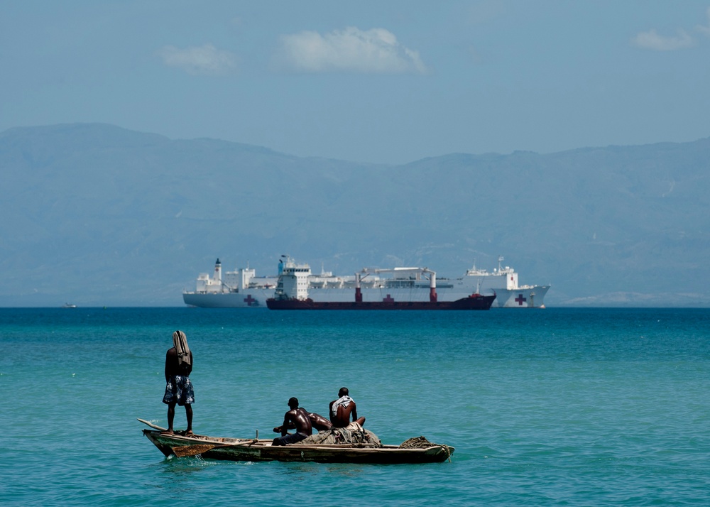 Haitian Fishermen Greet USNS Comfort During Humanitarian Mission