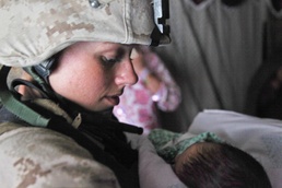 Marine Corps Lance Cpl. Connects with Afghan Women During Patrol