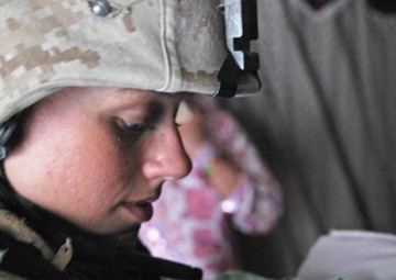 Face of Defense: Marine Reaches Out to Afghan Women