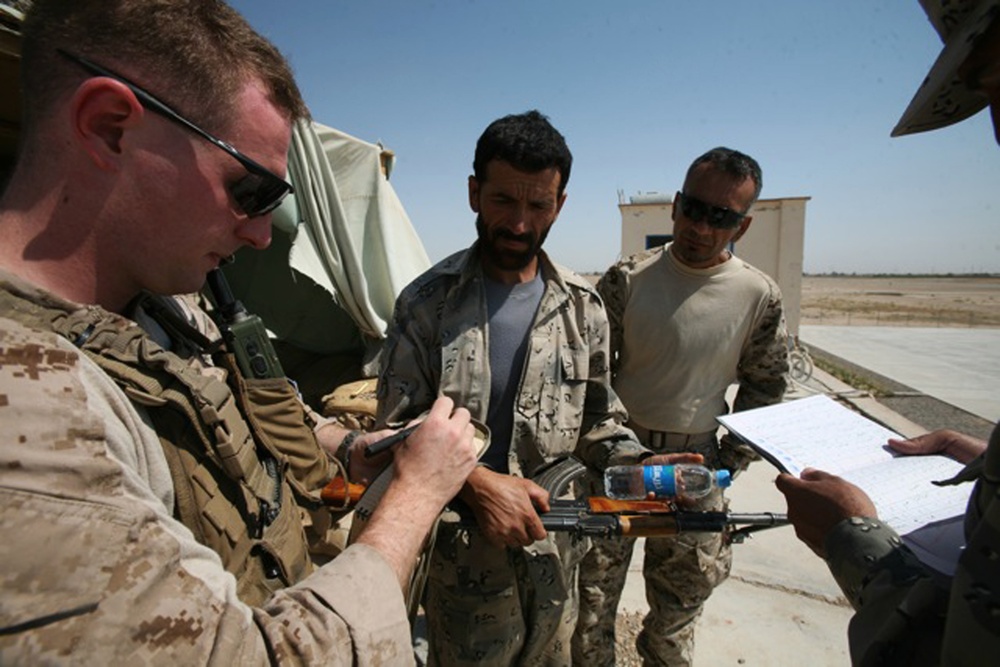 U.S. Marine Helps Inventory Afghan Border Police Weapons