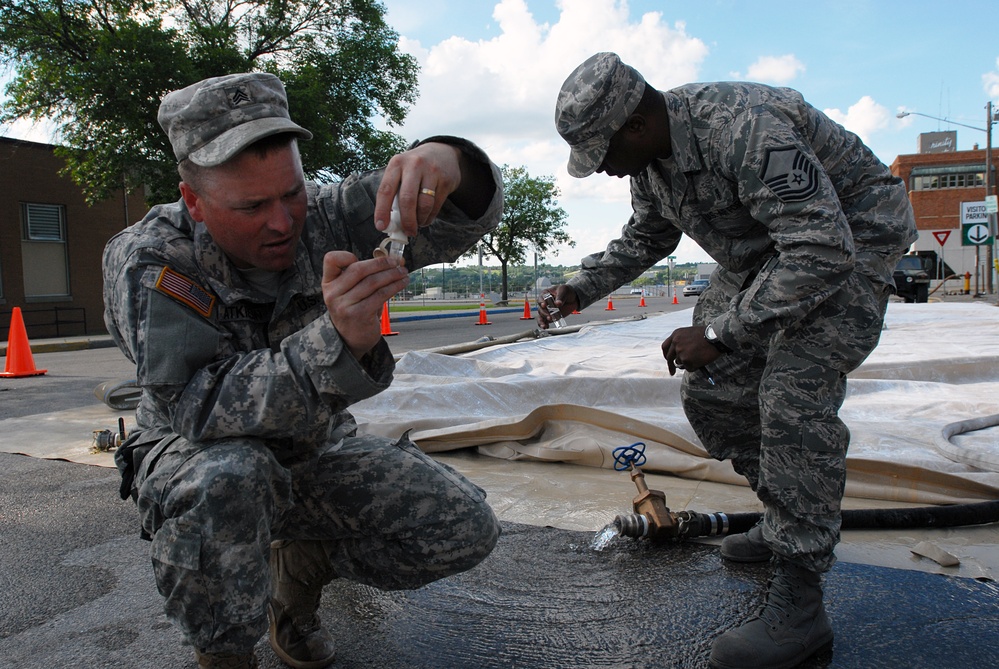National Guard Soldiers Provide Clean Water to Flooded Minot Hospital