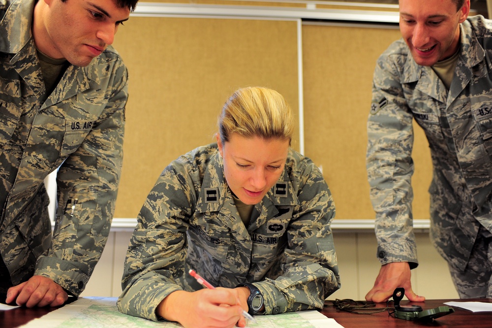 Air Force Officers Coordinate Mission Planning