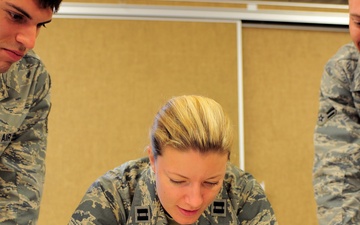 Air Force Officers Coordinate Mission Planning