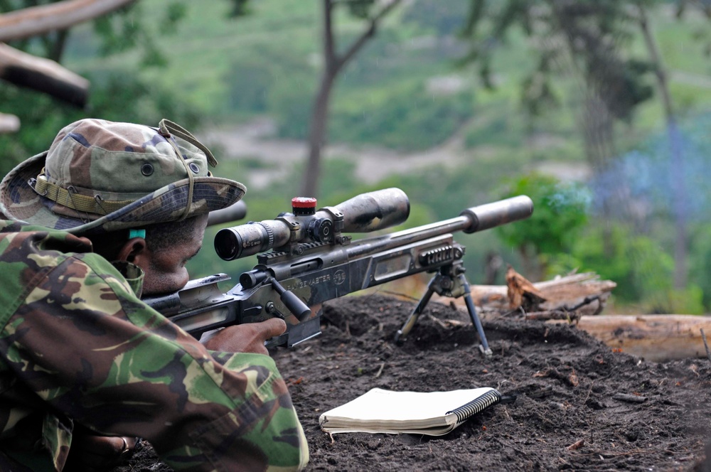 Brazilian Sniper Fires at Target During Fuerzas Comando Competition