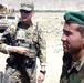 U.S. Army Sergeant Meets with Afghan Soldier at Checkpoint