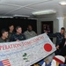 U.S. Pacific Fleet Commander Presents Japanese Defense Minister with Banner During Operation Tomodachi