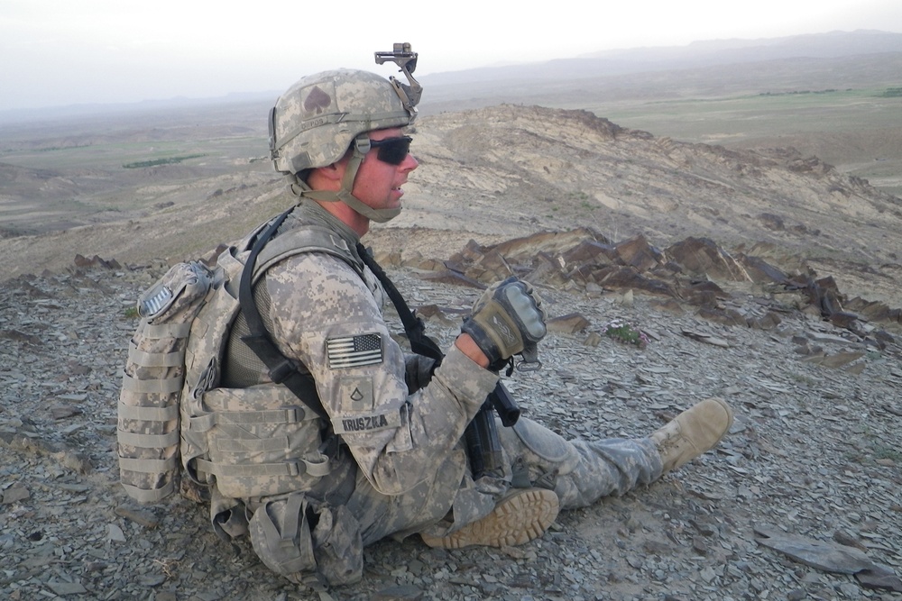Soldier Rests After Securing Key Terrain in Afghanistan