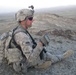 Soldier Rests After Securing Key Terrain in Afghanistan