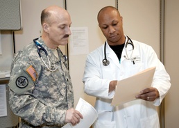 Cardiologists Discuss Patient Records at Brooke Army Medical Center
