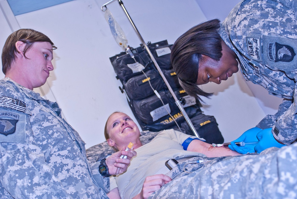 Army Medics Hone Blood-Drawing Skills at Afghanistan Clinic