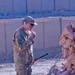 Soldier Brushes Teeth With Bottled Water at Remote Afghan Outpost