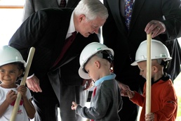 Defense Secretary Distributes Coins to Future Kindergarteners at Fort Riley Groundbreaking