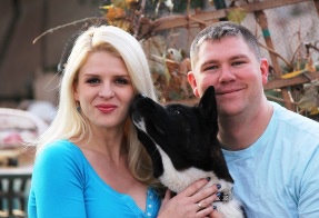 Retired Army Captain and Wife Pose with Dog