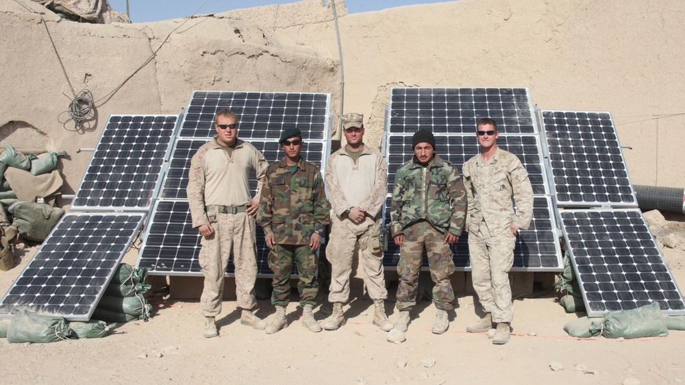 Marines, Sailors and Afghan Troops Pose with Solar Panels in Afghanistan