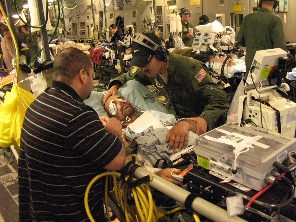 Air Force Surgeon Cares for Critical Patients During Medevac Flight