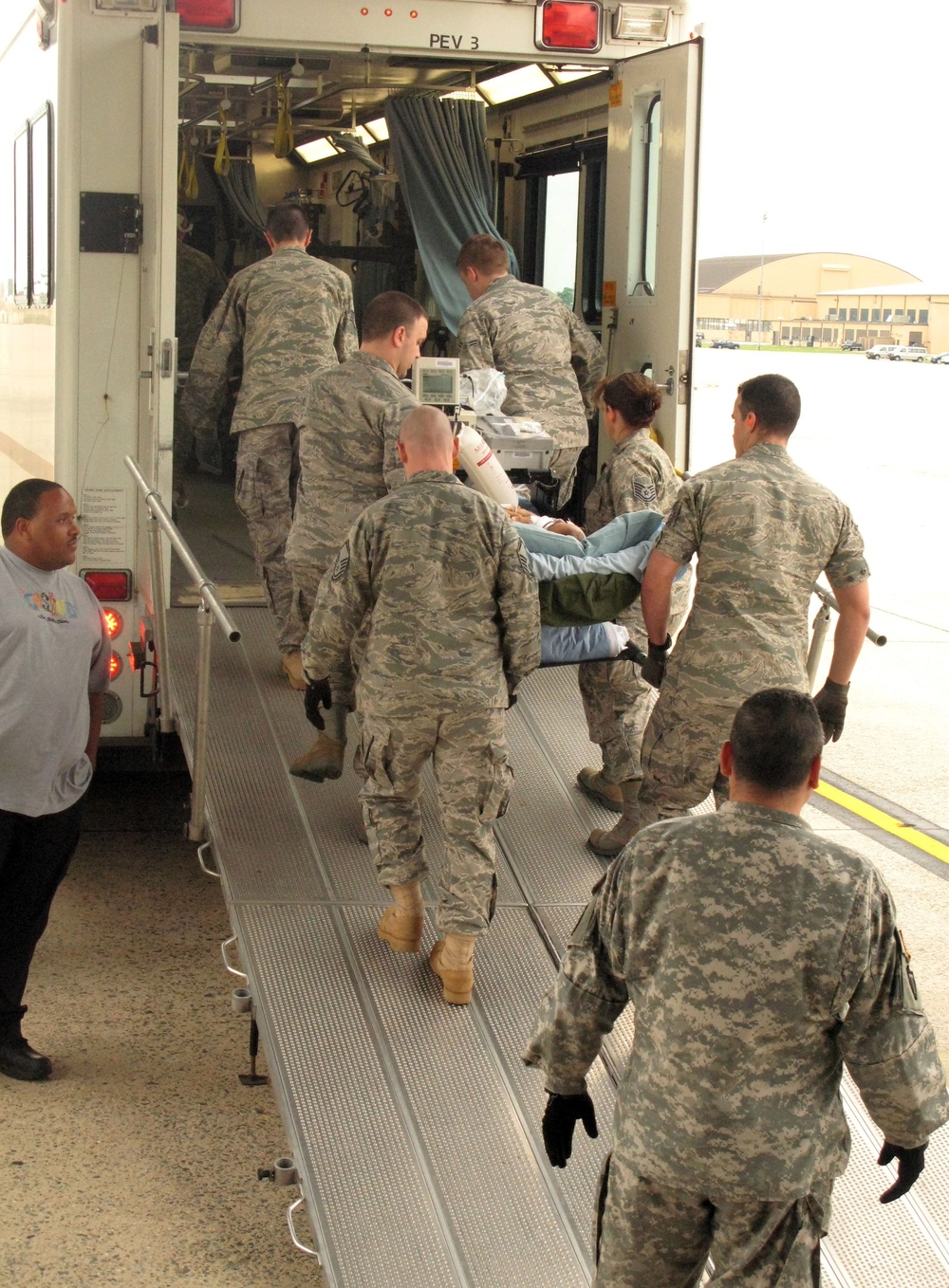 Aeromedical Evacuation Crew Transports Injured Soldier to Walter Reed