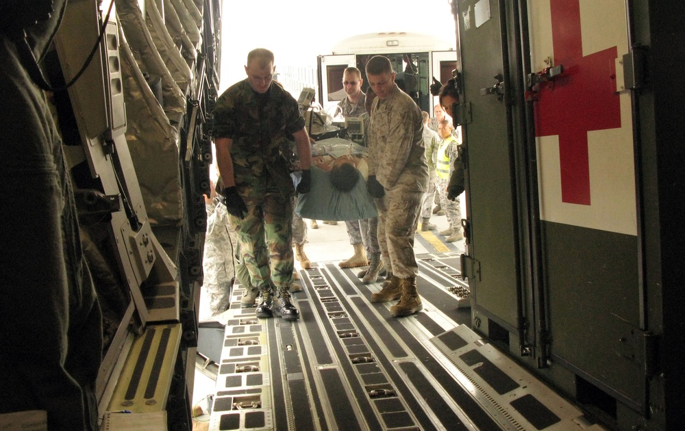 Wounded Warriors Evacuated Aboard C-17 for Advanced Care
