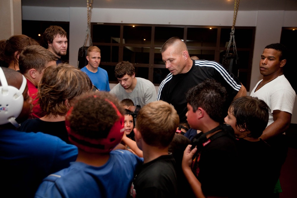 Marine Corps Master Sgt. Leads Youth Wrestling Team in Practice