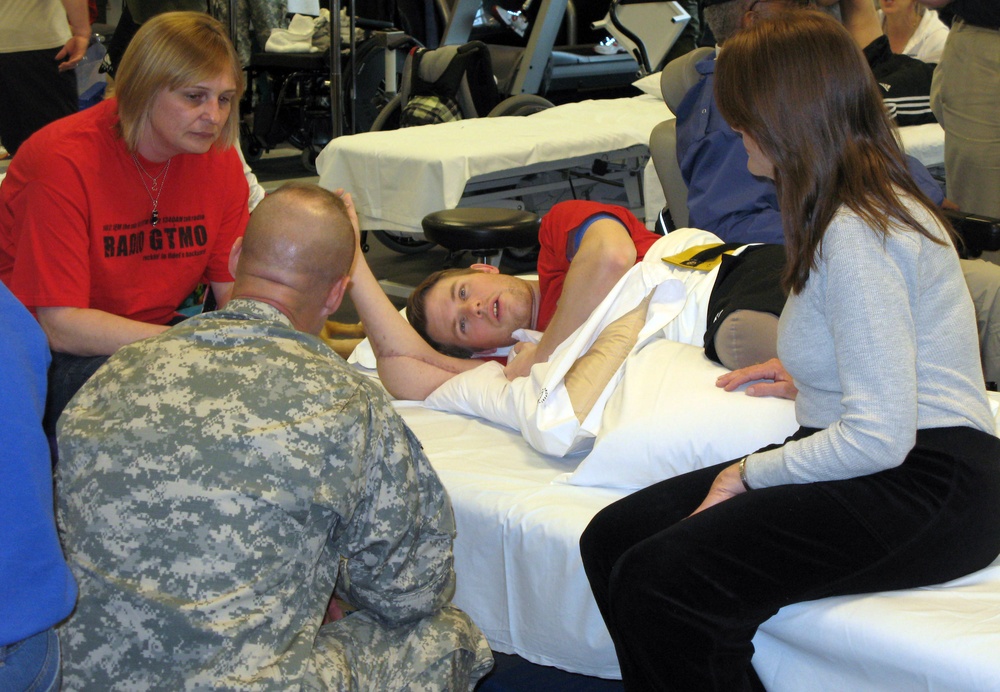 Army Staff Sgt. Charles Allen Reunites with Family at Walter Reed