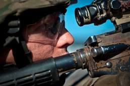 Army Sgt. Scans Mountainside During Combat Operation in Afghanistan