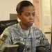 Army Captain Completes Daily Reports at Iraqi Base