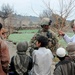 Army Sgt. Engages With Afghan Villagers During Patrol