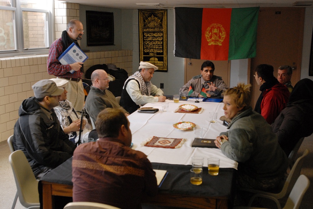 Afghan Role Player Meets with U.S. Officials During Civilian Expeditionary Workforce Training