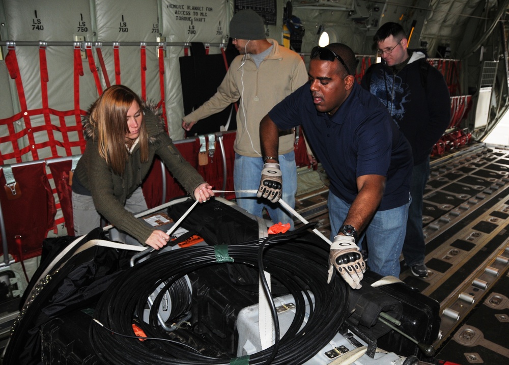Air Force Airmen Prepare C-130J for Humanitarian Aid Airlift to North Africa