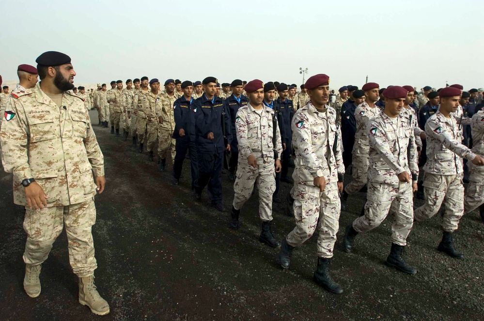 Kuwaiti Soldiers March in Formation for Independence Celebration