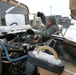 Missouri National Guard Soldier Performs Maintenance Checks on Tactical Vehicles
