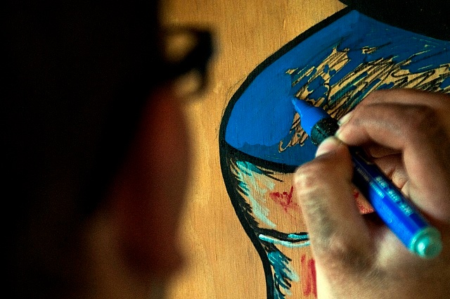 Soldier Completes Unit Logo at Observation Post in Afghanistan