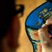 Soldier Completes Unit Logo at Observation Post in Afghanistan