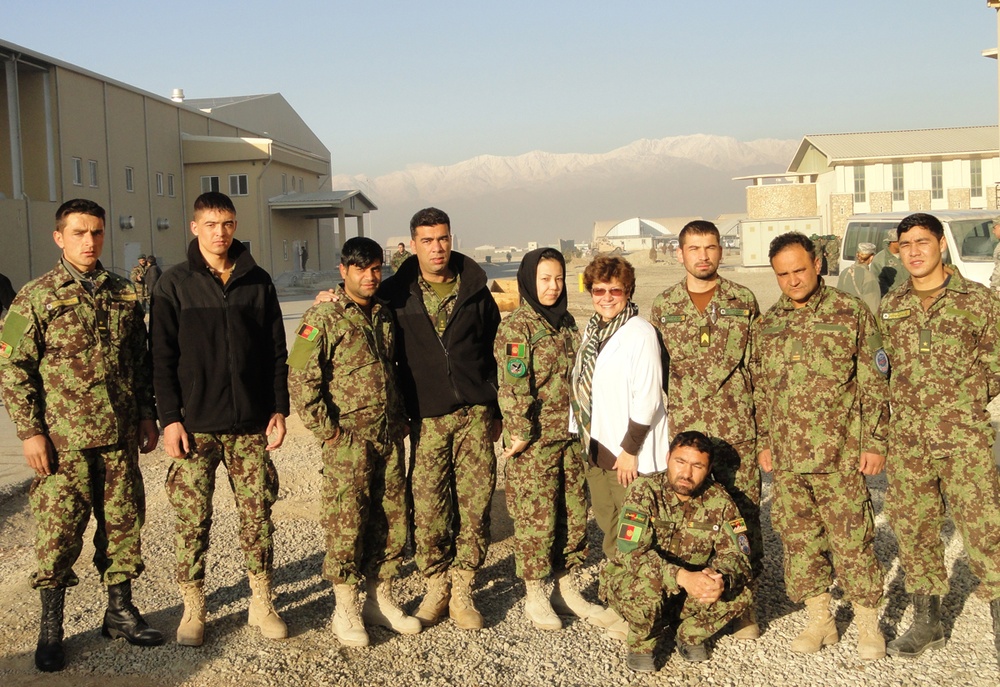 Teacher Brenda Colom Poses with Afghan Students in Kabul
