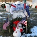 Fallen Soldier's Grave Adorned with Patriotic, Personal Mementos