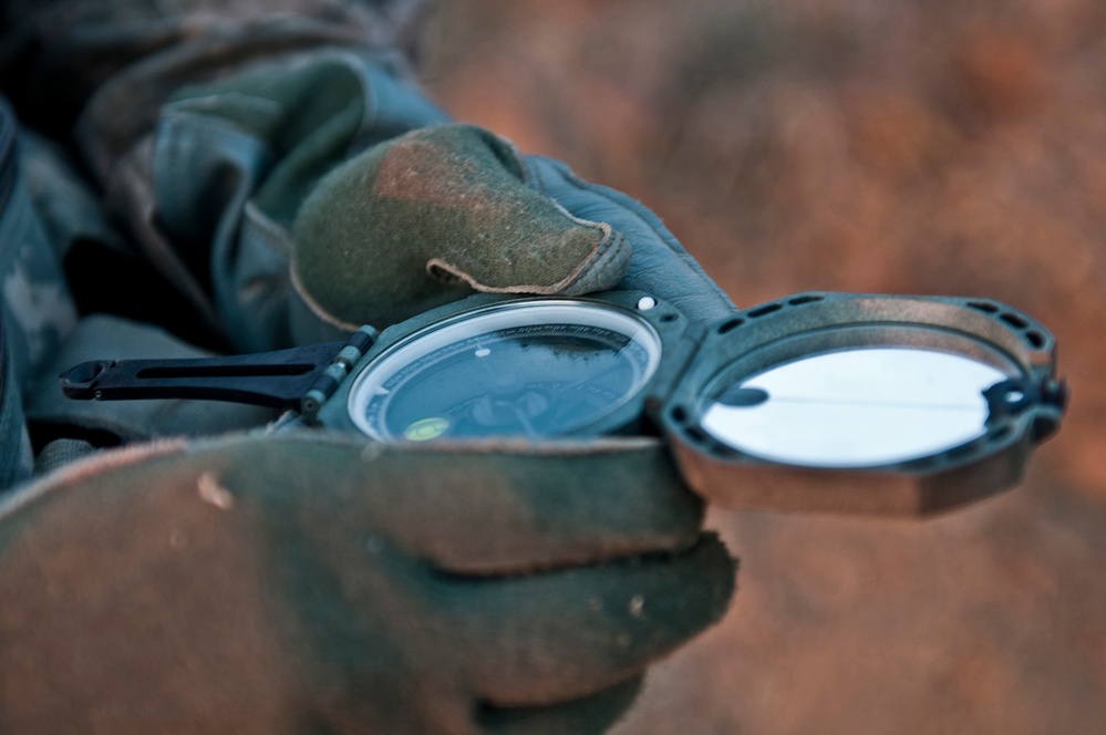 Mortarman Checks Coordinates Before Firing in Afghanistan