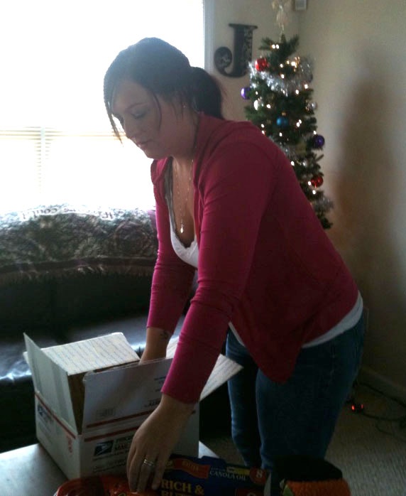 Soldier's Wife Prepares Care Package for Deployed Husband