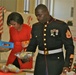 First Lady, Marine Corps Sergeant Sort Toys for Tots Program