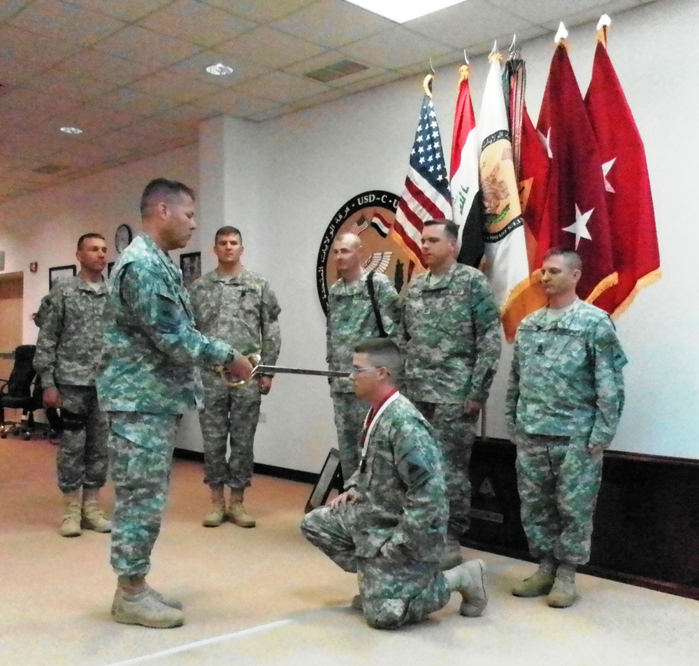 1st Armored Division Officer Inducts Soldier into Order of St. George