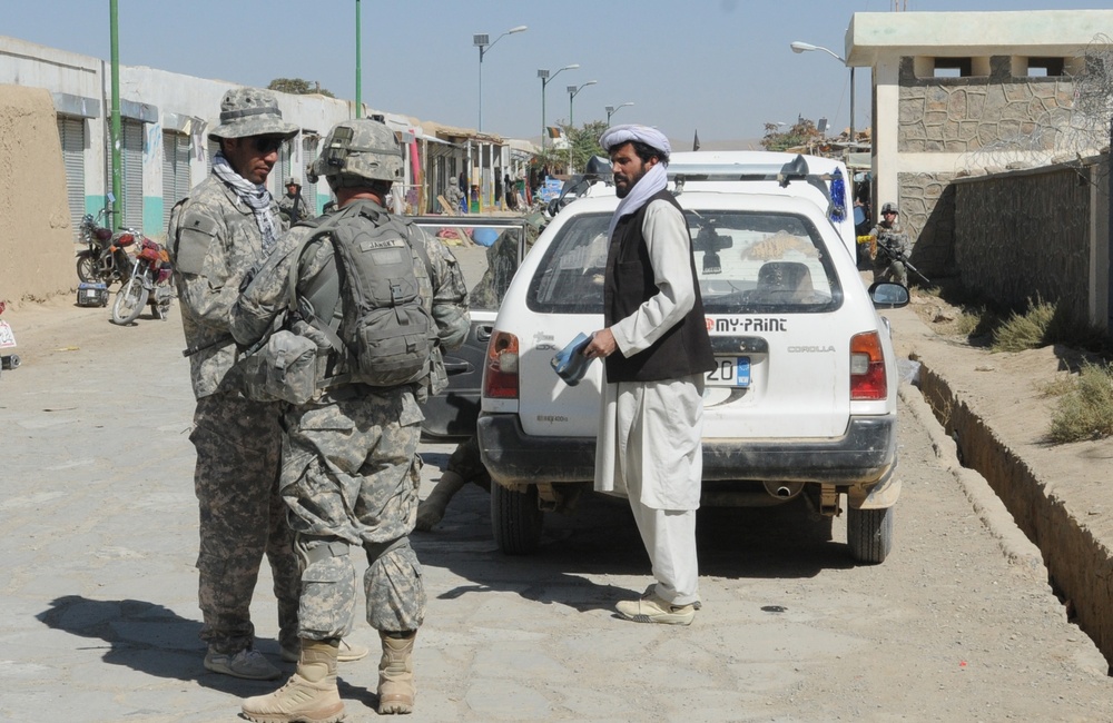 U.S. Army Sergeant Engages with Afghan Resident During Patrol