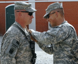 Army Father and Son Reunite in Afghanistan, as Son Pins Purple Heart on Father