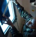 Air Force Technician Measures Mammogram Film to Detect Breast Cancer
