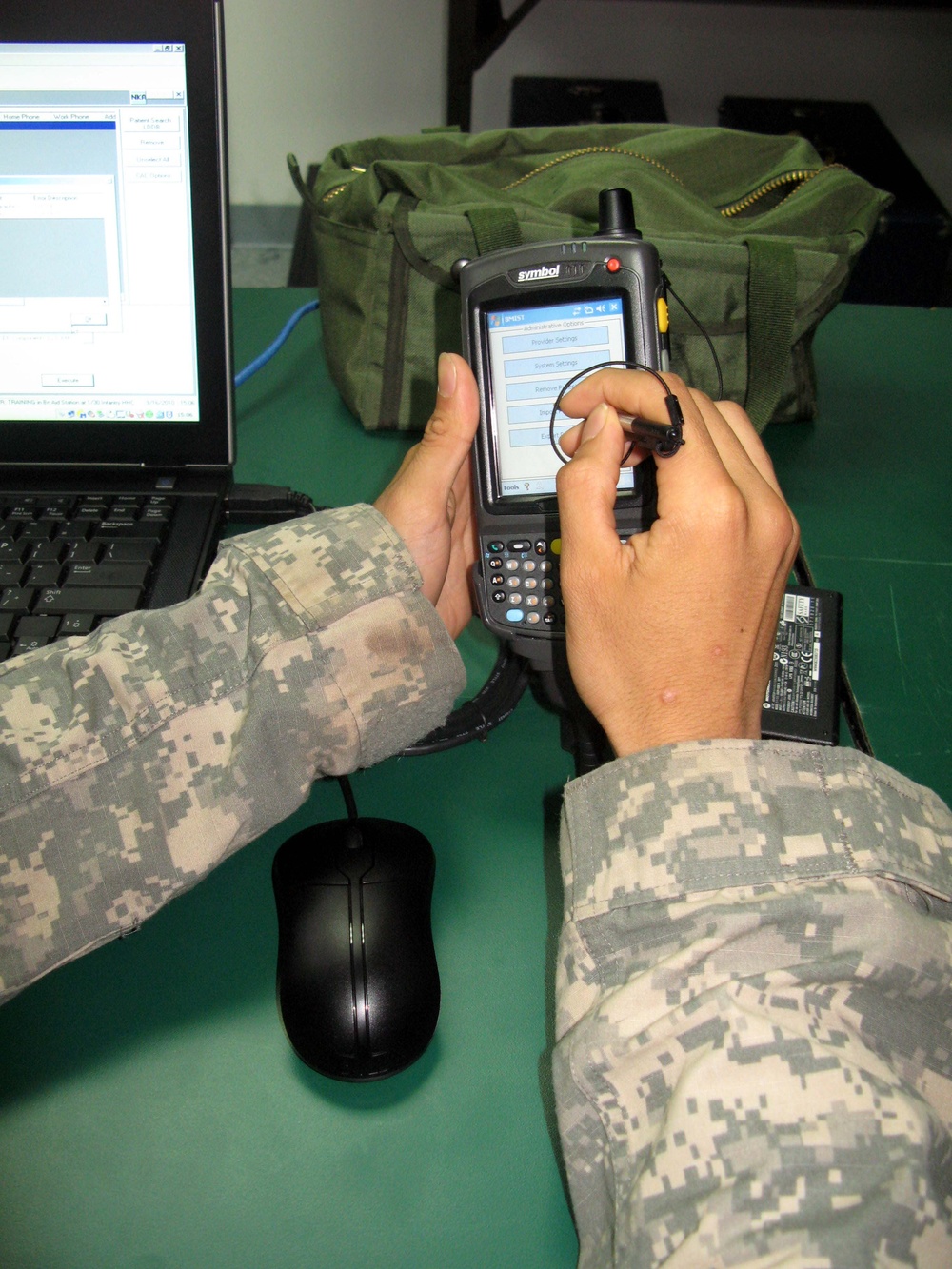 Combat Medic Trains on Medical Communications System for Forward Deployments